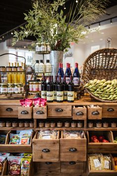 an assortment of food and drinks on display in a store