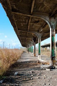 an abandoned train station in the middle of nowhere