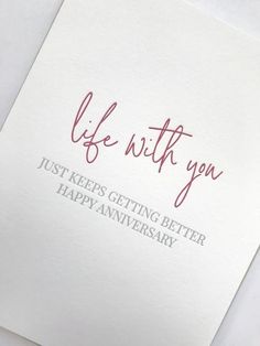 a card with the words, life with you just keeps getting better happy anniversary on it