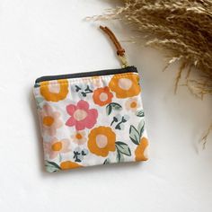 "Stash your odds and ends with this adorable square mini zipped pouch! As beautiful as it is functional, these bags are perfect for travel or everyday use! A mini first aid kit, a manicure set, jewelry holder or small makeup bag - it can be used for any organizational purpose!  Buy it for yourself or as a thoughtful gift to a friend or a family member! Makes a great gift paired with a gift card holder.  Specs: Approx 5\"x4\" Metall ykk zipper  Zipper is accented with a leather pull tag Lined with a coordinating cotton print  Machine Washable, hang dry" Cute Rectangular Wallets For Everyday Use, Cute Handmade Cosmetic Bag For Everyday Use, White Zipper Pouch Coin Purse For Gift, Cute Rectangular Coin Purse With Zipper, White Zipper Coin Purse As A Gift, White Zipper Coin Purse As Gift, White Coin Purse With Zipper Pouch As Gift, White Coin Purse As A Gift, Cute Travel Coin Purse With Zipper