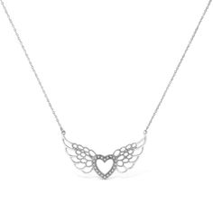 Gift this romantic and stylish diamond angel wings to your special angel. Styled on sterling silver this pendant features a glistening heart flies on brightly polished widespread angel's wings embellished with 20 pave set round cut diamonds. This whimsical pendant hangs from a beautiful cable chain. Total diamond weight is 1/20 ctw. Diamond Angel, Arrow Tattoo, Fairy Wings, Heart Pendant Necklace, Round Cut Diamond, Angel Wings, Cable Chain, Heart Pendant, Round Cut