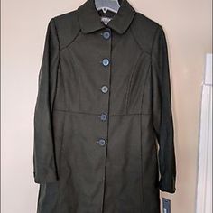 Kenneth Cole Reaction Size 10 Olive Colored Wool Jacket. New With Tags! Button Front Placket. Dual Inseam Pockets. Single Button At Cuff. Fall Outerwear With Covered Buttons, Fall Collared Pea Coat, Collared Outerwear With Buttons For Office, Collared Office Outerwear With Buttons, Green Button-up Outerwear With Double Button Closure, Green Outerwear With Buttons For Fall, Casual Fitted Pea Coat With Button Closure, Fall Long Coat With Covered Buttons, Long Coat With Covered Buttons For Fall