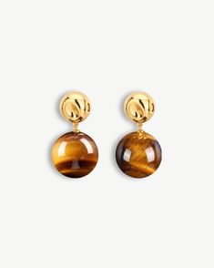 a pair of tiger's eye earrings on a white background Brown Gemstone Drop Earrings, Brown Natural Stone Drop Earrings, Elegant Tortoiseshell Drop Earrings, Brown Streaks, Chanel Loafers, Tiger Eye Earrings, Personal Empowerment, Brown Earrings, Sophie Buhai