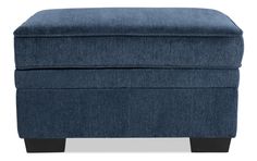 the foot stool is made from denim fabric and has black legs, with a dark wood frame