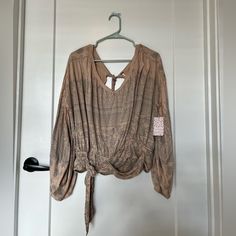 Super Cute Boho Free People Top. The Back Is Partially Open With A Tie At The Neck And Another Around The Waste. Brand New With Tags! Beige Long Sleeve Tops With Boho Print, Beige Boho Print Long Sleeve Tops, Casual Beige Tops With Boho Print, Casual Beige Boho Print Top, Boho Print V-neck Top For Day Out, Boho Free People, Crochet Bell Sleeve, Ruffle T Shirt, Free People Long Sleeve