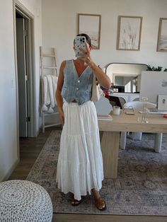 White Skirt And Denim Vest, Womens Work Outfits Summer, Denim Boho Outfit, Boho Maxi Skirt Outfit Summer, How To Style Vests For Women, White Flowy Skirt Outfit Summer, Denim Vest Summer Outfit, Denim Vest White Skirt Outfit, Boho Skirt Outfit Summer Styles