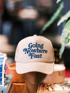 Going Nowhere Fast Trucker Hat - Golden Hour BoutiqueTrucker Hat Neutral Trucker Hat, Tan Trucker Hat, Going Nowhere, Women Trucker, Black Trucker Hat, Trendy Hat, Puff Print, Hat Ideas, Farm Girl