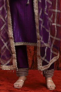 Purple kurta with gota, dori and badla embroidered placket and cuffs. Paired with a pant with gota embroidered panels and chequered pattern dupatta. - Aza Fashions Designer Traditional Wear With Dupatta For Party, Designer Traditional Wear With Gota Work, Purple Salwar Kameez For Celebrations, Designer Sets With Gota Work For Festivals, Designer Traditional Wear With Gota Work For Festive, Designer Sets With Gota Work For Eid, Designer Traditional Wear With Gota Work For Festive Occasions, Designer Unstitched Sets With Dupatta, Elegant Unstitched Suit With Gota Work For Celebration