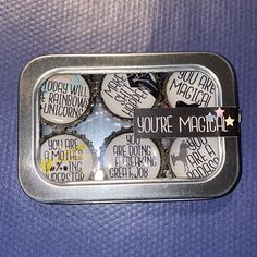 a tin filled with lots of different types of magnets