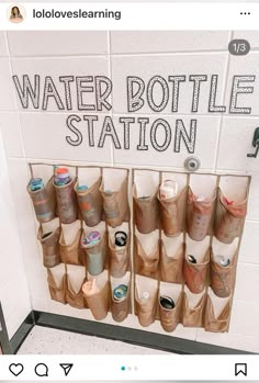 the water bottle station is filled with cups