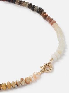 The Encirkled Coffee Gemstone Beaded Necklace is our favorite way to wear neutrals in beautiful amber and chocolate hues- the ultimate addition to your neck stack. This piece includes assorted gemstones featuring a 14k spring ring closure, that is perfect for displaying your favorite charms. 8mm assorted gemstones that may include agate, amber, aventurine, chocolate moonstone, hessonite, goldstone, jasper, peach moonstone, pearl, Peruvian opal, rainbow moonstone, red tiger's eye, smoky quartz, t Everyday Elegant Brown Jewelry, Brown Elegant Everyday Jewelry, Elegant Brown Everyday Jewelry, Amber Gemstone Beads Rondelle Jewelry, Amber Rondelle Gemstone Beads Jewelry, Brown Gemstone Jewelry With Round Beads, Elegant Brown Beaded Necklace With Gemstone Beads, Elegant Brown Gemstone Beaded Necklaces, Brown Single Strand Round Bead Jewelry