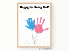 two handprints with the words happy birthday dad are displayed on a white wall