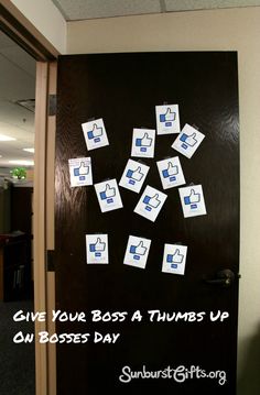 a door with stickers on it that says give your boss a thumbs up our boss's day