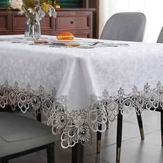 the table is covered with white lace