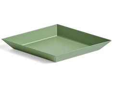 an empty green tray on a white background