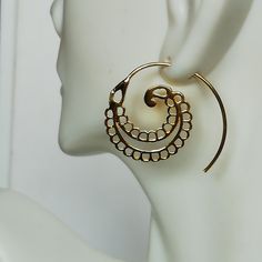 ONE PAIR of open ended sterling silver spiral hoops plated in real gold. Dimensions: 23 x 22 mm These earrings are made of 925 hypoallergenic sterling silver plated in gold. Can be packaged in a gift box. I can include a personal message from you if needed You are welcome to contact me at... bhavnakwintra1956@gmail.com For more beautiful pieces from my shop, please browse 👇 TOE RINGS: https://www.etsy.com/your/shops/TheSilverGame/tools/listings/section:27020628,view:table EAR HOOPS: https://www Bohemian Gold Spiral Wrap Earrings, Unique Spiral Metal Hoop Earrings, Bohemian Gold Swirl Jewelry, Gold Spiral Hoop Earrings Nickel-free, Gold Spiral Hoop Earrings Nickel Free, Spiral Brass Hoop Earrings With Ear Wire, Gold Spiral Hoop Earrings, Nickel-free Spiral Gold Hoop Earrings, Unique Gold Cartilage Earrings With Ear Wire