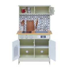 a toy kitchen set with an oven, stove and counter top in white painted wood