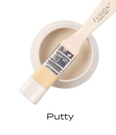 a paint brush with the words putty on it