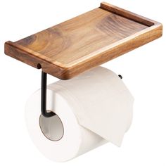 a wooden tray on top of a roll of toilet paper next to a black metal holder