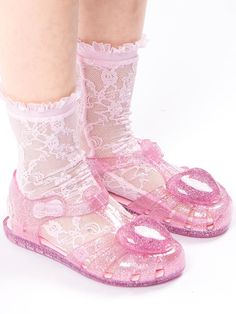 These charming LED jelly sandals for girls feature a delightful heart pattern that lights up with each step, powered by a built-in LED battery system that's been tested for over 250,000 illuminations. The shoes combine sparkling pearl glitter with practical features including an easy-adjust Velcro strap, non-slip outsole, and flexible, comfortable material that maintains its shape. Made by premium Finnish-inspired kids' brand LOVE OF MY CHILD (LOMC), these sandals are available in various sizes Bunny Heels, Led Heart, Heart Glitter, Shopping Shoes, Led Shoes, Shoes Socks, Flower Shoes, Shoes Pink, Jelly Shoes