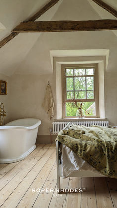 Follow the link to achieve this look!
Jane from @parkplacegower, whose work has been showcased in Country Homes and Interiors magazine, is an expert in creating eclectic yet refined home styles. Her master bath and bedroom, featuring Roper Rhodes products, are no exception. Jane crafted a stunning, characterful space with a warm palette and rustic finishes. Bath In Bedroom, Cottage Bathroom Inspiration, European Farmhouse Decor, Small Bathroom Mirrors, Bath Bedroom, Blue Bathroom Furniture, Roper Rhodes