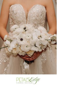 a bride holding her wedding bouquet with white flowers in her hands and the words petal & co floral designs on it