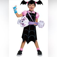 Get Your Little One Ready For Halloween With This Adorable Disney Junior Vampirina Costume. The Complete Costume Includes A Dress And Gloves, Perfect For Keeping Your Child Warm On Chilly Trick-Or-Treaters. The Multi-Colored Costume Is Designed For Girls And Is Available In Size 3t-4t. This Costume Is Perfect For Any Halloween Celebration And Is Sure To Make Your Child Stand Out. The Vampire Theme And Disney Brand Make This Costume A Must-Have For Any Disney Fan. Made In China And Featuring The Halloween Costume For 4, Dress And Gloves, Halloween Kids Costumes Girls, Classic Halloween Costumes, Black And Pink Dress, Halloween Adventure, Halloween Express, Disney Cosplay, Toddler Costumes