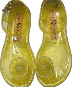 Adjustable Round Toe Jelly Sandals, Trendy Adjustable Jelly Sandals With Round Toe, Adjustable Round Toe Trendy Jelly Sandals, Adjustable Trendy Jelly Sandals With Round Toe, Trendy Yellow Jelly Sandals For Vacation, Yellow Jelly Sandals With Round Toe For Vacation, Yellow Closed Toe Jelly Sandals For Spring, Trendy Adjustable Closed Toe Jelly Sandals, Trendy Yellow Jelly Sandals For Summer