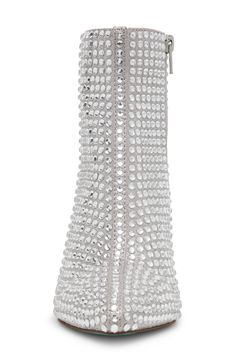 Step out in glam style with this rhinestone-encrusted pointy-toe bootie fashioned with a glossy block heel to complete the instantly iconic look. 3 1/2" heel 4" shaft Side zip closure Textile upper/synthetic lining and sole Imported Glamorous Embellished Ankle Boots, Glamorous Embellished Boots For Formal Occasions, Glamorous Embellished Ankle Boot Heels, Glamorous Embellished Heeled Boots With Pointed Toe, Chic Embellished Heeled Boots For Night Out, Chic Embellished High Heeled Boots, Glamorous Embellished Heeled Boots For Party, Chic Formal Bling Boots, Glamorous Embellished Evening Boots