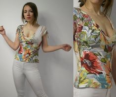 Y2K Roberto Cavalli blouse / Floral summmer designer shirt / small Brand: Roberto Cavalli Size: S Model in the photos is size 8UK/4US; 164 cm/5'5'' Measurements, flat / approximate measurements: Overall length: 51 cm (20.0787'') Materials:  Very good condition with light signs of wear Due to camera and your monitor settings colors may appear slightly different than they are in real life. PLEASE read description. For better fitting I would suggest you compare measurements to a garment that you have in your closet to ensure a proper fit. No returns in case of the bad fit! SHIPPING: the item will be ship like priority mail from Lithuania, Europe. I'm not responsible for delays due to customs or post offices, so please be patient. If you need some item for specific date please contact me first Summer V-neck Fitted Blouse, Fitted V-neck Summer Top, Fitted Floral Print Blouse For Summer, Fitted Short Sleeve Blouse For Summer, Summer Fitted V-neck Blouse, Fitted Summer Beach Blouse, Fitted Beach Blouse For Summer, Fitted Blouse For Summer Beach Outings, Summer Printed Fitted Top