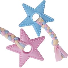 two star shaped toys are tied together