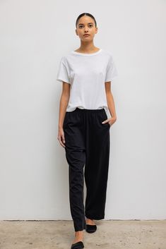 Cut in our shape-holding, 100% cotton, the Margo Tapered Pocket Pant is an easy, pull-on style pant with a straight, relaxed leg and a comfortable elastic waistband. Match it with our best-selling Margo Tee in Black. Shop all styles in this fabric group Style Pant, Satin Set, Fabric Shoes, Everyday Chic, Black Shop, Black Xs, Margot Robbie, Classic Dress, Pocket Pants