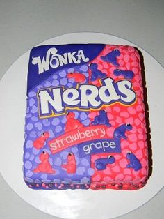 there is a cake made to look like a bag of nerds on the plate