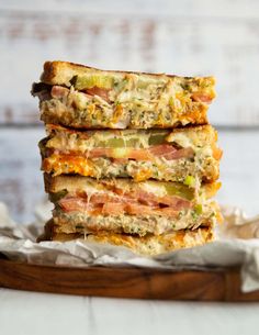 three sandwiches stacked on top of each other