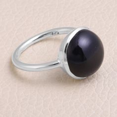 Black Onyx Ring, Sterling Silver Ring, Black Stone Rings, Black Onyx Ring Women's, Handmade Ring, Black Onyx Wedding Ring, Gift For Her Natural Black onyx ring with 925 sterling silver, handmade statement ring, real gemstone silver ring jewelry Item: Ring Ring size: Please select from the drop-down list Metal: High-Quality sterling silver (925 silver) Gemstone: Black Onyx Round (8x8 mm) #gemstonering #925sterlingsilver #silverring #Roundring #daintyring #Onyxring #weddingband #goldwddingband #mi Black Amethyst Promise Ring, Onyx Cabochon Rings, Round Onyx Cabochon Rings, Onyx Cabochon Round Rings, Black Moonstone Gemstone Ring, Black Stone Rings, Onyx Wedding Ring, Ring Black Stone, Rings Black