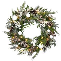 a christmas wreath with white balls and pine cones on the front, surrounded by lights