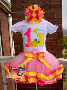 Personalized Embroidery Lemonade Birthday Ribbon Trimmed Tutu Set, Lemons, Any Birthday, Birthday outfit, Cake Smash, Tutu dress 0-18 Months will be a bodysuit and 2T up will be a shirt If you order a tutu and Shirt I include a hairbow for Free. The Hairbow will match the outfit but it will not always be just like the one pictured. I can make this set with for any age. I can change colors upon request. I only use boutique quality shirts which are super soft and true to size. All my products are Birthday Ribbon, Lemonade Birthday, Ribbon Trim Tutu, Bee Birthday, Sour Patch Kids, Tutu Outfits, Personalized Embroidery, Girls Clothing Sets, Patch Kids