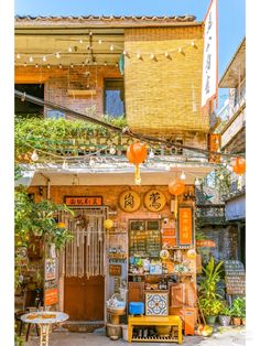 an outdoor shop with lots of decorations on the front and side of it's building