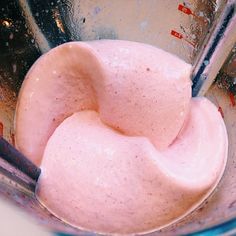 a blender filled with pink colored liquid