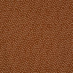 a brown background with white dots