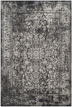 an area rug with black and white colors