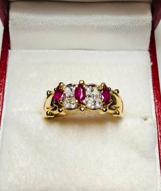 Absolutely Stunning Vintage 14k Yellow Gold Natural Ruby Diamond Ring 100% Natural Ruby and Diamonds Beautiful genuine Ruby Ruby: 0.50CT Diamond(s) .10CT Color: G Clarity: SI2 Total ring weight: 3.5GR 14K Yellow Gold Ring sizing available Free of Charge For more information regarding this item feel free to reach me so I can accommodate your needs. Thank you Elegant Marquise Ruby Ring With Vvs Clarity, Formal Ruby Ring With Diamond Accents In Cluster Shape, Classic Marquise Ruby Ring With Vvs Clarity, Formal Cluster Ruby Ring With Diamond Accents, Classic Ruby Jewelry With Marquise Cut, Classic Yellow Gold Ruby Ring With Marquise Cut, Classic Marquise Cut Ruby Ring In Yellow Gold, Classic Yellow Gold Marquise Cut Ruby Ring, Classic Marquise Cut Ruby Jewelry