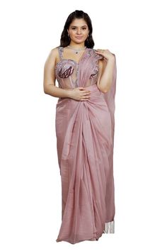 Dusky rose pre-draped skirt saree with a detachable pallu and beaded hand embroidery. Comes with a padded corset blouse. - Aza Fashions Fitted Organza Blouse Piece With Traditional Drape, Fitted Draped Lehenga For Party Wear, Organza Pre-draped Saree For Reception, Elegant Sleeveless Organza Pre-draped Saree, Elegant Gown With Dori Work And Traditional Drape, Elegant Sets With Dori Work For Evening, Fitted Draped Choli For Party Wear, Elegant Draped Pink Lehenga, Elegant Evening Pre-draped Saree With Dori Work