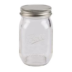 a glass mason jar with a metal lid