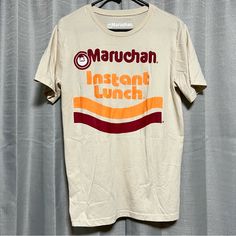 New Without Tags! Maruchan Instant Lunch T-Shirt Unisex Size Large There Are No Flaws, Discoloration Or Pilling As This Has Never Been Worn. This Is In Excellent Condition! Nwot! Mustard Graphic Print Cotton T-shirt, Mustard Cotton T-shirt With Graphic Print, Storm Trooper Shirt, Red Bathing Suits, Xmas Wishlist, Nba T Shirts, Shark T Shirt, Striped Short Sleeve Shirt, Cream Yellow