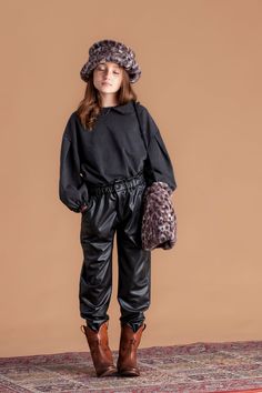 Soft and supple faux leather pants with warm lining on the inside. 100% POLYESTER Kids Leather Pants, Tocoto Vintage, Kids Pants, Faux Leather Pants, Puffed Sleeves, Kids Sweatshirt, Style Guides, Puff Sleeve, Baby Dolls