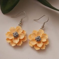 Stay fashionable this year with flower jewelry from US Fashion World  - Material: Earrings made from sterling steel hook, fashion resin. - Size: Orange flower earring 1.6x0.9 in. Lily flower 2.1x0.5 in. - Elegant and beautiful high quality earrings, perfect for any occasion. - Unique handmade earrings to make a statement. - Design adopts a combination of classical and modern styles. - Stylish to wear and make an ideal gift for Mom, sister, friends, family... We have our own fashion jewelry store Dangle Flower Earrings With 3d Flowers For Gifts, Gift Flower Dangle Earrings With 3d Flowers, Flower Earrings With Ear Wire As Gift, Flower Shaped Earrings With Ear Wire For Gift, Flower Shaped Earrings With Ear Wire As Gift, Flower Shape Earrings With Ear Wire For Gift, Adjustable Handmade Flower Earrings, Adjustable 3d Flower Drop Earrings, Adjustable 3d Flower Earrings