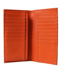 100% Dolce & Gabbana product Crocodile patterned leather Bifold wallet design Card holder bill slots and coin pocket Silver metal detailing Logo engraved metal hardware Made in Italy Dimensions: 10cm x 19cm x 2cm Material: 100% Crocodile Leather Orange Country, Wallet With Coin Pocket, Functional Style, Engraved Metal, Pocket Logo, Metal Engraving, Leather Bifold Wallet, Crocodile Leather, Bifold Wallet