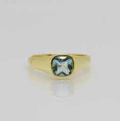 Vintage Sterling Silver 14K Gold Plated Aquamarine Ring...Marked 925...Total of weights 2.2grams... Size 7...Measure of Face 7MM...It's in very good condition. 14k Yellow Gold Topaz Ring With Vs Clarity, Classic Gold Rings With Blue Topaz, Yellow Gold Rings With Blue Topaz And 17 Jewels, Vintage Gemstone Engraved Ring Collectible, Antique Handmade Signet Ring Collectible, Handmade Antique Agate Rings, Antique Gold-colored Sterling Silver Signet Ring, Antique Handmade Agate Rings, Antique Grunge