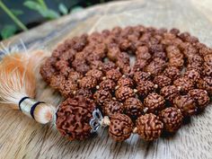 This attractive and powerful Japa Mala is made with Rudraksha bead that are naturally stained and oiled to achieve their beautiful dark color and aged appearance. 📿Mala Beads, or Buddhist prayer beads, are a set of sacred rosary beads for chanting & counting mantras, meditation, prayer, yoga & reflection. Mala is a Sanskrit word meaning garland.📿 Specifications * 108 Rudraksha Seed (9-9.5mm approx.) soaked in oil to get darker color plus 17mm Guru Bead *Tassel Length - 3.5 - 4.0 Inches * This Tibetan Mala, Rudraksha Mala, Rudraksha Beads, Meditation Prayer, Silk Gifts, Buddhist Prayer, Mala Meditation, Sanskrit Words, Word Meaning